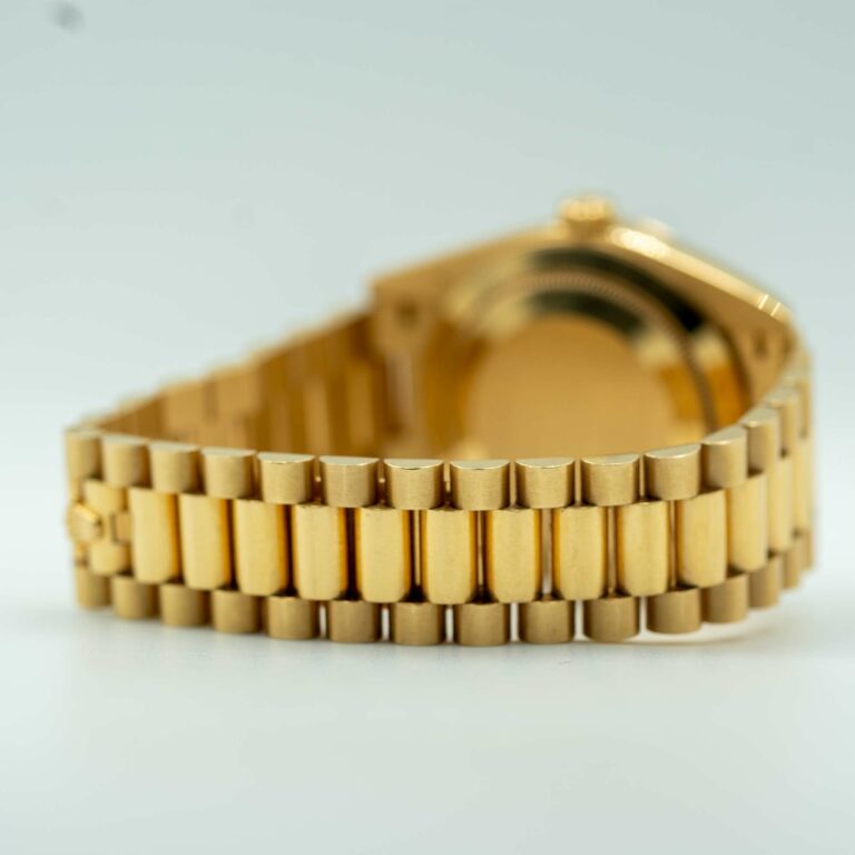 Rolex Day Date 40 Gold Black Motif dial