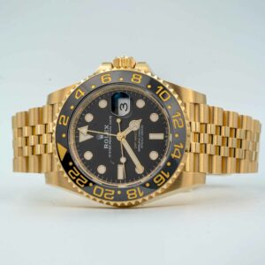 Rolex GMT Master II Yellow Gold Black Grey bezel